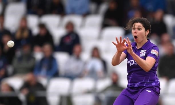 Superchargers bowler Alice Davidson-Richards reacts as she drops a difficult return catch off her own bowling during The Hundred match between...