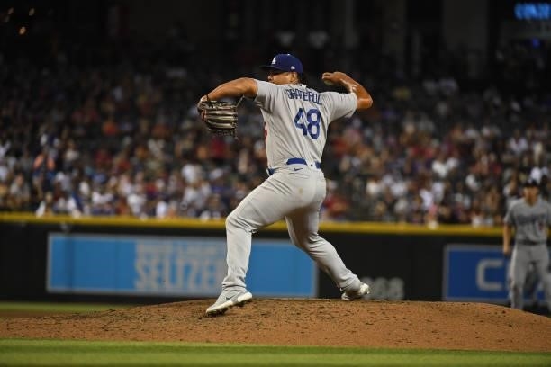 Brusdar Graterol of the Los Angeles Dodgers delivers a pitch against the Arizona Diamondbacks at Chase Field on July 30, 2021 in Phoenix, Arizona.