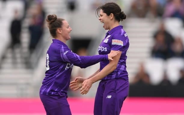 Superchargers bowler Alice Davidson-Richards celebrates with Bess Heath after taking the wicket of Sarah Bryce during The Hundred match between...