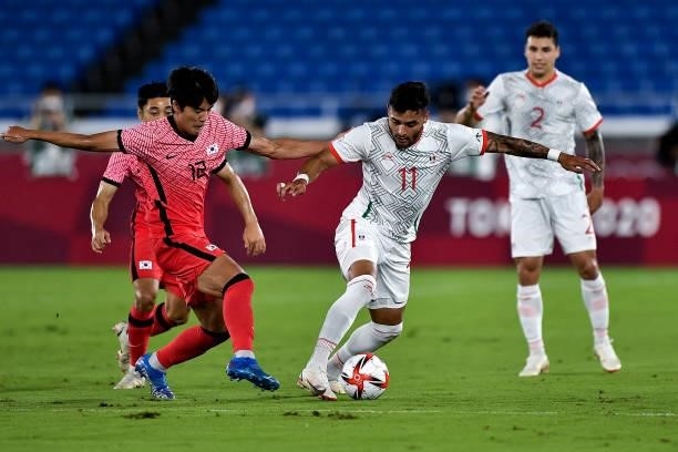 Young-woo Seol of South Korea and Ernesto Vega of Mexico during the Men's Football Tournament Quarter Final match between South Korea and Mexico on...