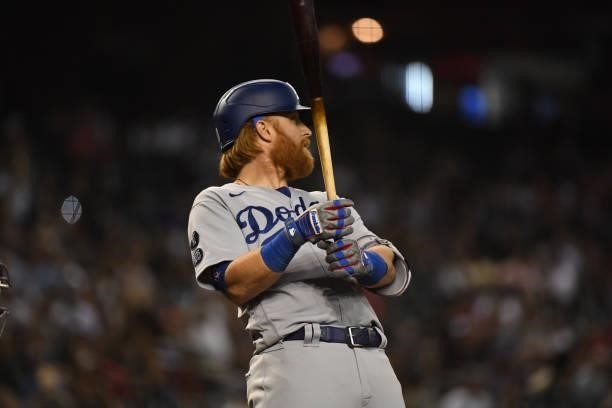 Justin Turner of the Los Angeles Dodgers gets ready in the batters box against the Arizona Diamondbacks at Chase Field on July 30, 2021 in Phoenix,...