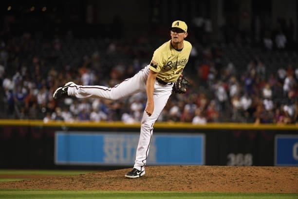 Tyler Clippard of the Arizona Diamondbacks delivers a pitch against the Los Angeles Dodgers at Chase Field on July 30, 2021 in Phoenix, Arizona.