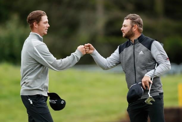 Daniel Hillier of Australia and Jordan Smith of England on the 18th green during day three of the ISPS HANDA World Invitational at Galgorm Spa & Golf...