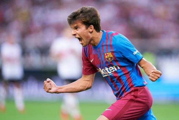 Riqui Puig of Barcelona celebrates after scoring his team's third goal during a pre-season friendly match between VfB Stuttgart and FC Barcelona at...