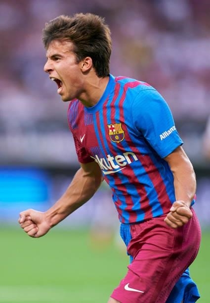 Riqui Puig of Barcelona celebrates after scoring his team's third goal during a pre-season friendly match between VfB Stuttgart and FC Barcelona at...