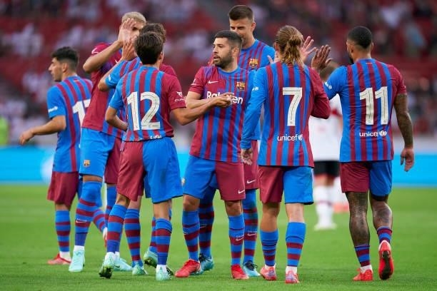Riqui Puig of Barcelona celebrates after scoring his team's third goal with his teammates during a pre-season friendly match between VfB Stuttgart...