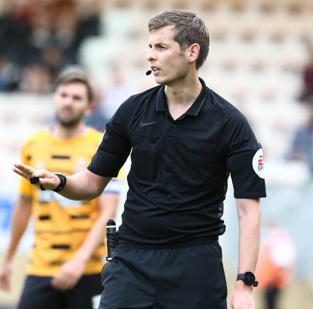 Referee Alan Dale in action during the Pre Season Friendly match between Cambridge United and Northampton Town at Abbey Stadium on July 31, 2021 in...