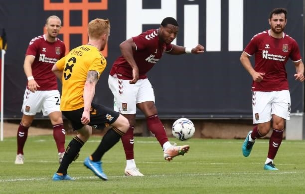 Ali Koiki of Northampton Town plays the ball during the Pre Season Friendly match between Cambridge United and Northampton Town at Abbey Stadium on...