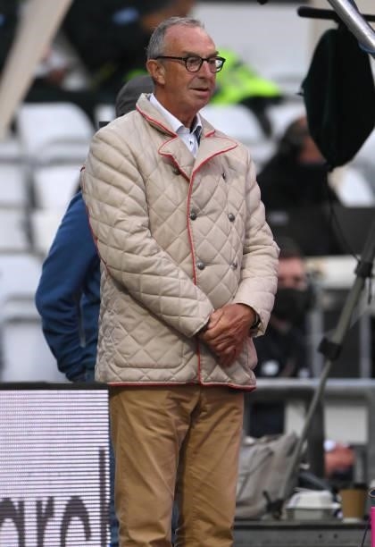 Sky Sports commentator David 'Bumble' Lloyd wearing a bonny coat looks on during The Hundred match between Northern Superchargers Women and Oval...