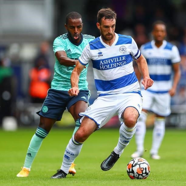Yoann Barbet of Queens Park Rangers is put under pressure by Ricardo Pereira of Leicester City during the Pre-Season Friendly match between Queens...