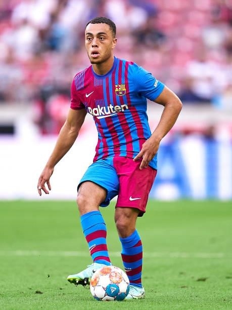Sergino Dest of FC Barcelona with the ball during a pre-season friendly match between VfB Stuttgart and FC Barcelona at Mercedes-Benz Arena on July...