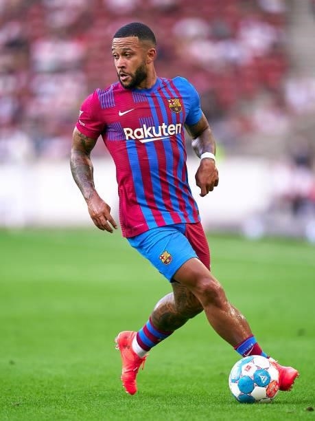 Memphis Depay of FC Barcelona with the ball during a pre-season friendly match between VfB Stuttgart and FC Barcelona at Mercedes-Benz Arena on July...