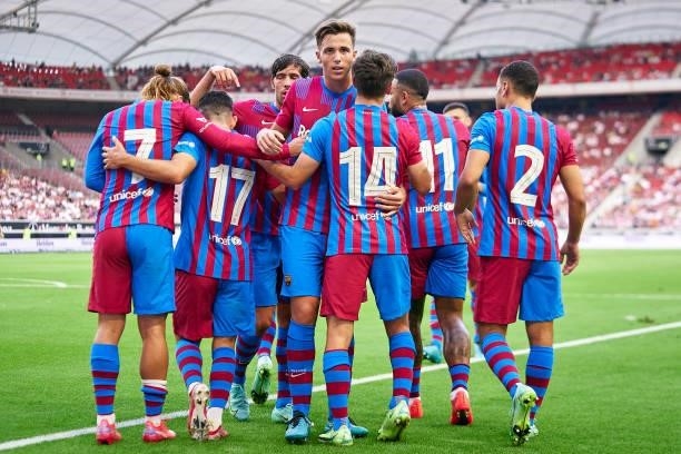 Players of FC Barcelona celebrating their team's second goal during a pre-season friendly match between VfB Stuttgart and FC Barcelona at...