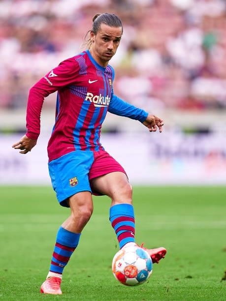 Antoine Griezmann of FC Barcelona with the ball during a pre-season friendly match between VfB Stuttgart and FC Barcelona at Mercedes-Benz Arena on...