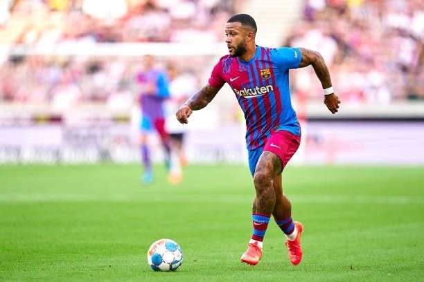 Memphis Depay of FC Barcelona with the ball during a pre-season friendly match between VfB Stuttgart and FC Barcelona at Mercedes-Benz Arena on July...