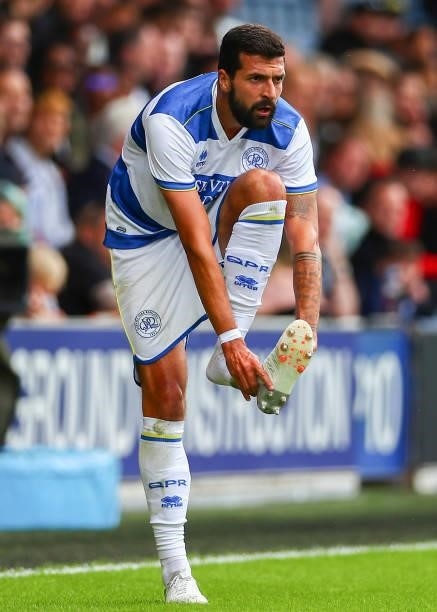 Yoann Barbet of Queens Park Rangers puts on his boot during the Pre-Season Friendly match between Queens Park Rangers and Leicester City at The Kiyan...