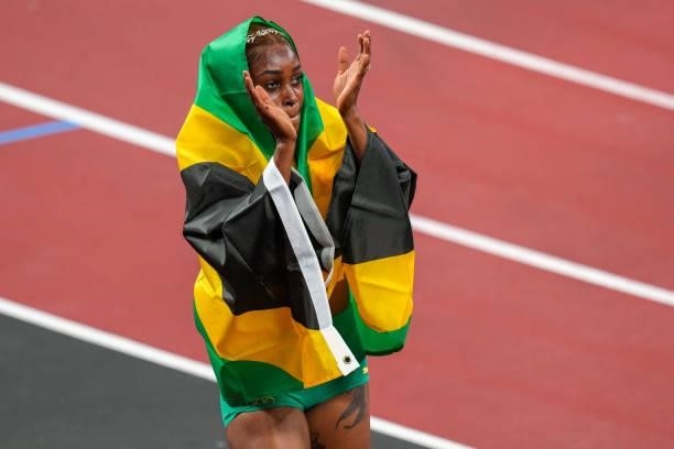 Elaine Thompson-Herah of Team Jamaica poses after winning the gold medal while competing on Women's 100m Final during the Tokyo 2020 Olympic Games at...