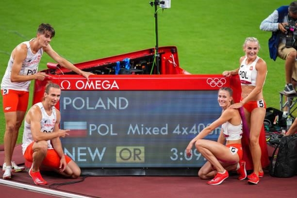 Kajetan Duszynski, Justyna Swiety-Ersetic, Karol Zalewski, Natalia Kaczmarek of Poland poses for a photo after competing on 4x400m Relay Mixed Final...