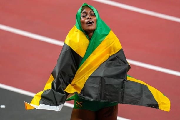 Elaine Thompson-Herah of Team Jamaica poses after winning the gold medal while competing on Women's 100m Final during the Tokyo 2020 Olympic Games at...
