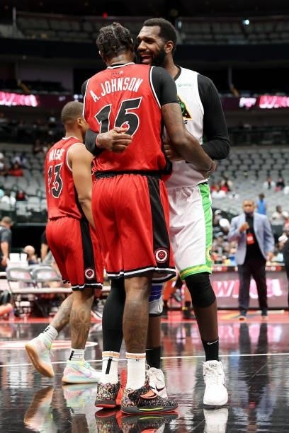 Amir Johnson of the Trilogy and Greg Oden of the Aliens meet after the Trilogy beat the Aliens 50-32 during BIG3 - Week Four at the American Airlines...