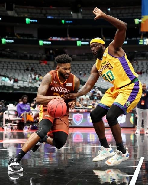 Alonzo Gee of the Bivouac dribbles the ball while being guarded by Reggie Evans of the 3 Headed Monsters during BIG3 - Week Four at the American...
