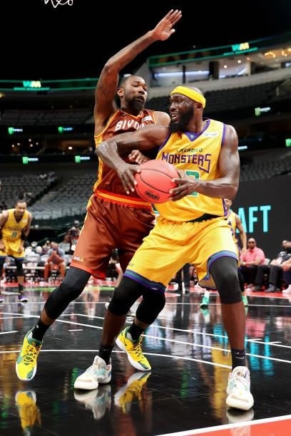 Reggie Evans of the 3 Headed Monsters handles the ball while being guarded by Cory Jefferson of the Bivouac during BIG3 - Week Four at the American...