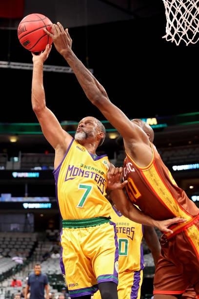 Mahmoud Abdul-Rauf of the 3 Headed Monsters and Mickell Gladness of the Bivouac battle for a loose ball during BIG3 - Week Four at the American...