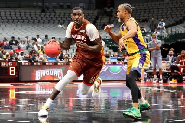 Quincy Miller of the Bivouac dribbles the ball while being guarded by Mahmoud Abdul-Rauf of the 3 Headed Monsters during BIG3 - Week Four at the...
