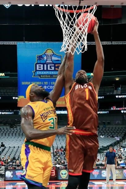 Cory Jefferson of the Bivouac attempts a shot while being guarded by Reggie Evans of the 3 Headed Monsters during BIG3 - Week Four at the American...