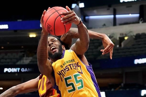 Kevin Murphy of the 3 Headed Monsters dribbles the ball while being guarded by Mickell Gladness of the Bivouac during BIG3 - Week Four at the...