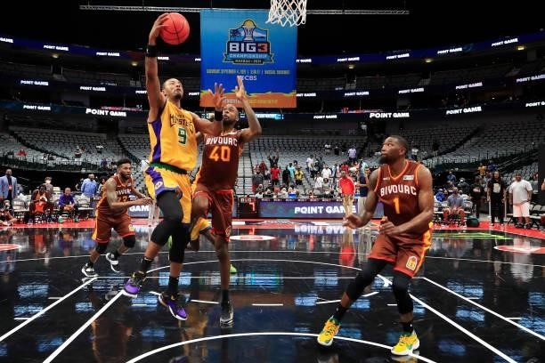 Rashard Lewis of the 3 Headed Monsters attempts a layup while being guarded by Mickell Gladness of the Bivouac during BIG3 - Week Four at the...