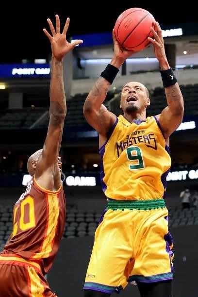 Rashard Lewis of the 3 Headed Monsters attempts a shot while being guarded by Mickell Gladness of the Bivouac during BIG3 - Week Four at the American...