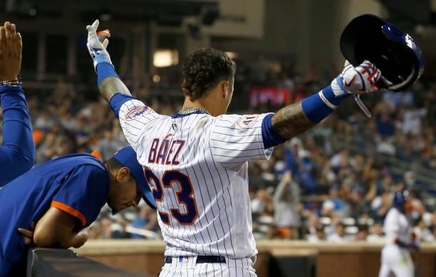Javier Baez of the New York Mets acknowledges a curtain call after his sixth inning two run home run against the Cincinnati Reds at Citi Field on...