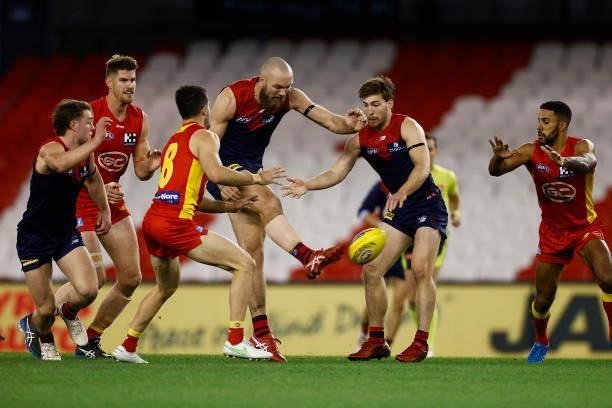 Max Gawn of the Demons kicks the ball during the round 20 AFL match between Gold Coast Suns and Melbourne Demons at Marvel Stadium on August 01, 2021...