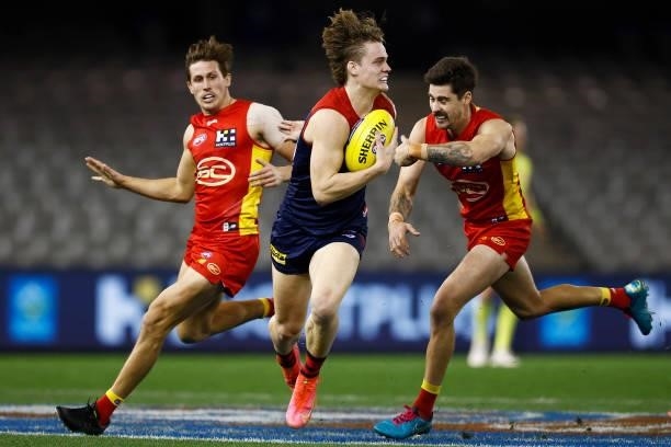 Trent Rivers of the Demons runs with the ball during the round 20 AFL match between Gold Coast Suns and Melbourne Demons at Marvel Stadium on August...