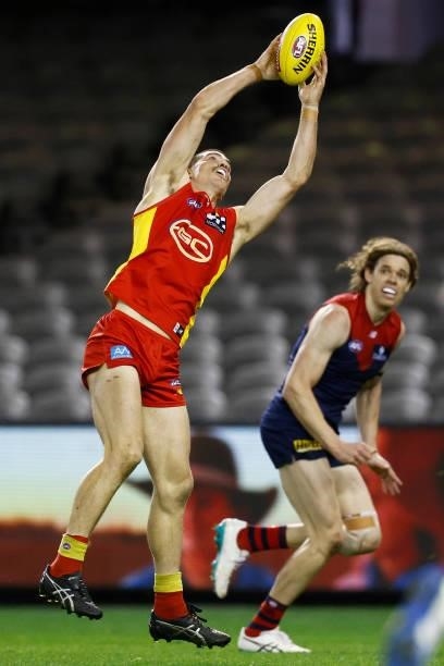 Sam Collins of the Suns marks the ball during the round 20 AFL match between Gold Coast Suns and Melbourne Demons at Marvel Stadium on August 01,...