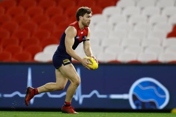 Jack Viney of the Demons runs with the ball during the round 20 AFL match between Gold Coast Suns and Melbourne Demons at Marvel Stadium on August...