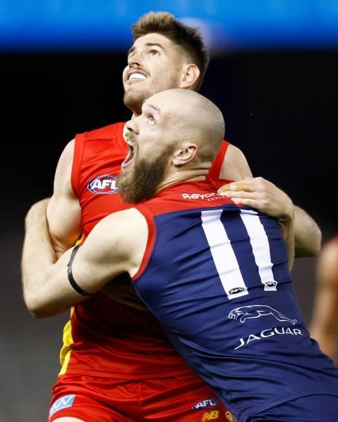 Max Gawn of the Demons and Zac Smith of the Suns contest the ruck during the round 20 AFL match between Gold Coast Suns and Melbourne Demons at...