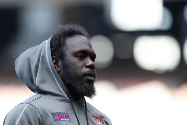 Anthony McDonald-Tipungwuti of the Bombers is seen warming up during the round 20 AFL match between Essendon Bombers and Sydney Swans at Melbourne...