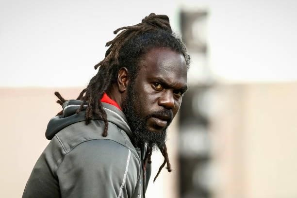 Anthony McDonald-Tipungwuti of the Bombers warms up before the round 20 AFL match between Essendon Bombers and Sydney Swans at Melbourne Cricket...