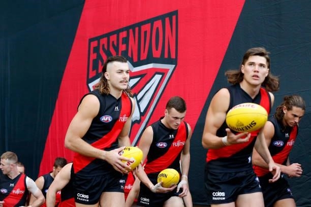 Essendon players run out before during the round 20 AFL match between Essendon Bombers and Sydney Swans at Melbourne Cricket Ground on August 01,...