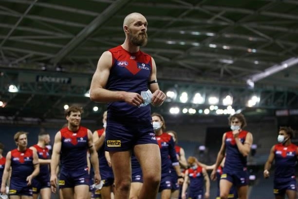 Max Gawn of the Demons leads his team off the field after winning the round 20 AFL match between Gold Coast Suns and Melbourne Demons at Marvel...