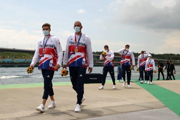 Bronze medalists Thomas George and Moe Sbihi of Team Great Britain walk after receiving their medals during the medal ceremony for the Men's Eight...