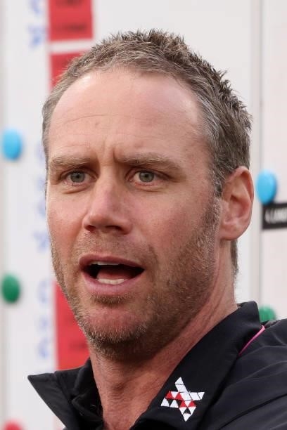 Essendon Coach Ben Rutten addresses his team during the round 20 AFL match between Essendon Bombers and Sydney Swans at Melbourne Cricket Ground on...