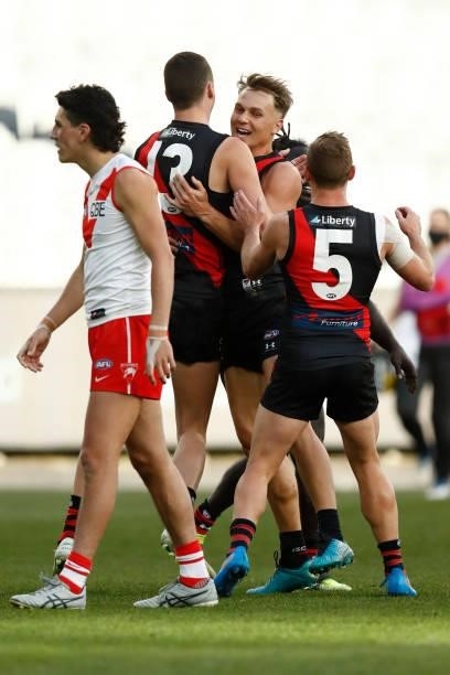 Dylan Clarke of the Bombers celebrates a goal during the round 20 AFL match between Essendon Bombers and Sydney Swans at Melbourne Cricket Ground on...