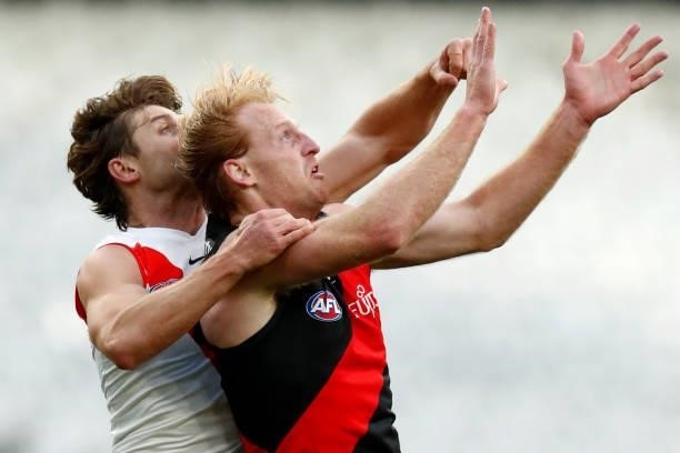 Dane Rampe of the Swans spoils Aaron Francis of the Bombers during the round 20 AFL match between Essendon Bombers and Sydney Swans at Melbourne...