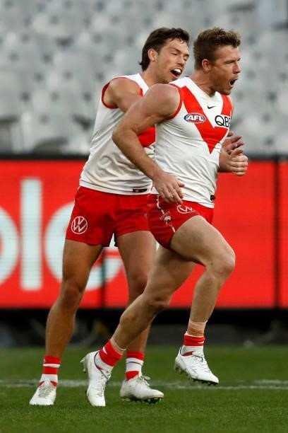 Luke Parker of the Swans celebrates a goal during the round 20 AFL match between Essendon Bombers and Sydney Swans at Melbourne Cricket Ground on...