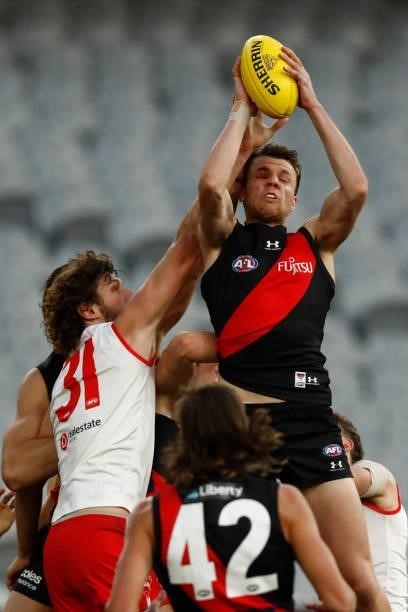 Jordan Ridley of the Bombers marks the ball during the round 20 AFL match between Essendon Bombers and Sydney Swans at Melbourne Cricket Ground on...