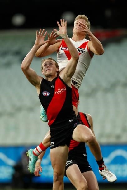 Isaac Heeney of the Swans leaps for a mark during the round 20 AFL match between Essendon Bombers and Sydney Swans at Melbourne Cricket Ground on...