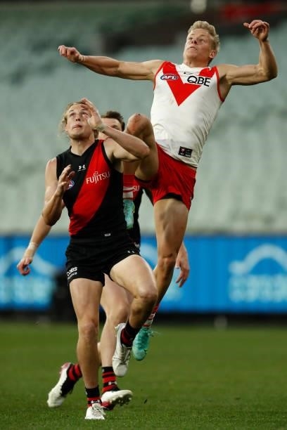 Isaac Heeney of the Swans leaps for a mark during the round 20 AFL match between Essendon Bombers and Sydney Swans at Melbourne Cricket Ground on...